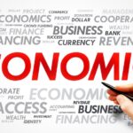 Economics on paper and pen in hand